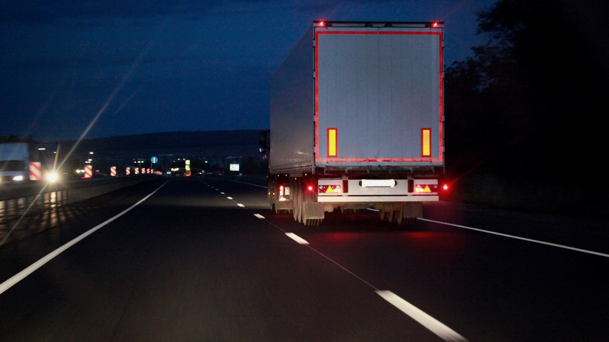 Dry van trailer running a dark Northeast highway at night as the diesel price increase of July 2026 raises the real cost per mile